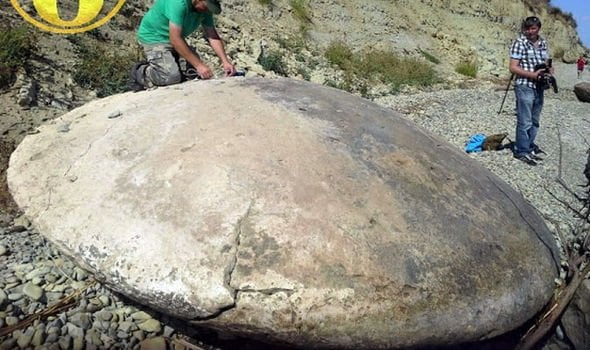 Mysterious Disc-Shaped Stone Object Discovered In Russia And Some Say It Came From Outer Space