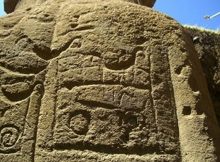 A close-up of petroglyphs on the back of one of the statues. Image credit: EISP.ORG