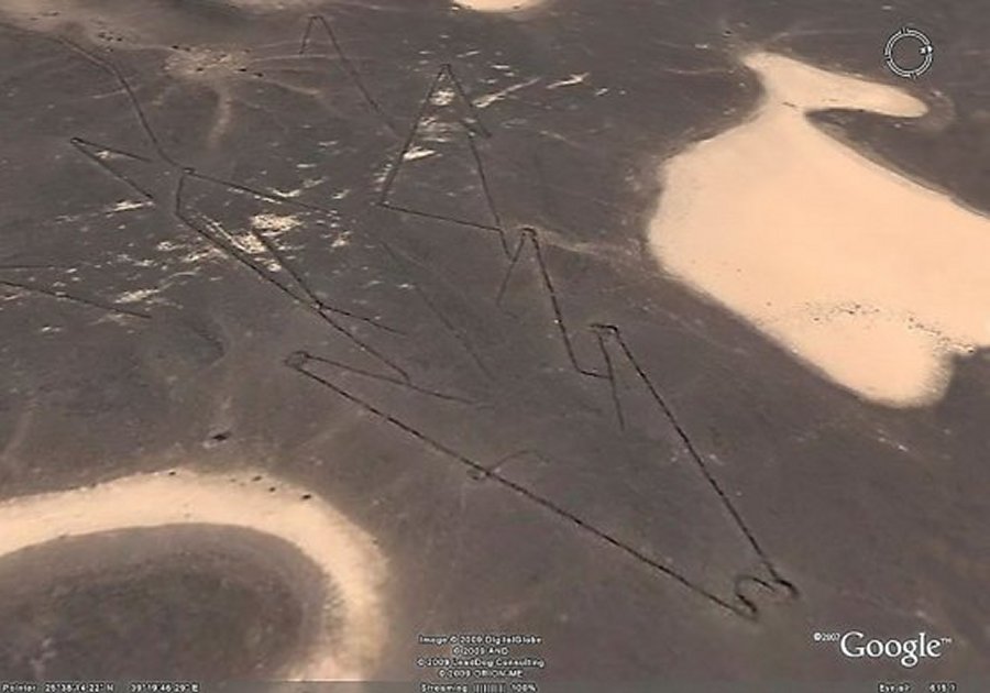 Arabian Peninsula: The dark lines are the remains of stone walls barely visible on the ground.