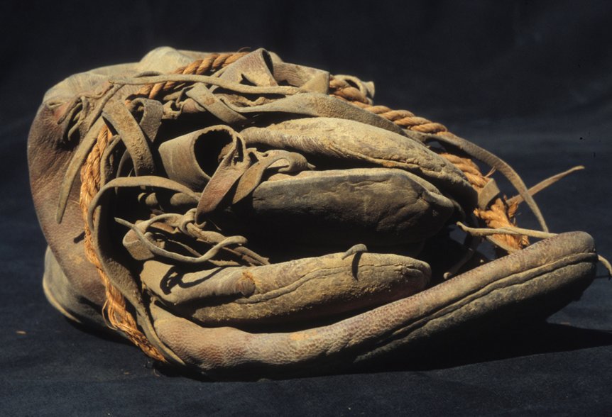Archaeologists are trying to solve the mystery of some ancient, shoes that were deliberately hidden in an Egyptian temple.