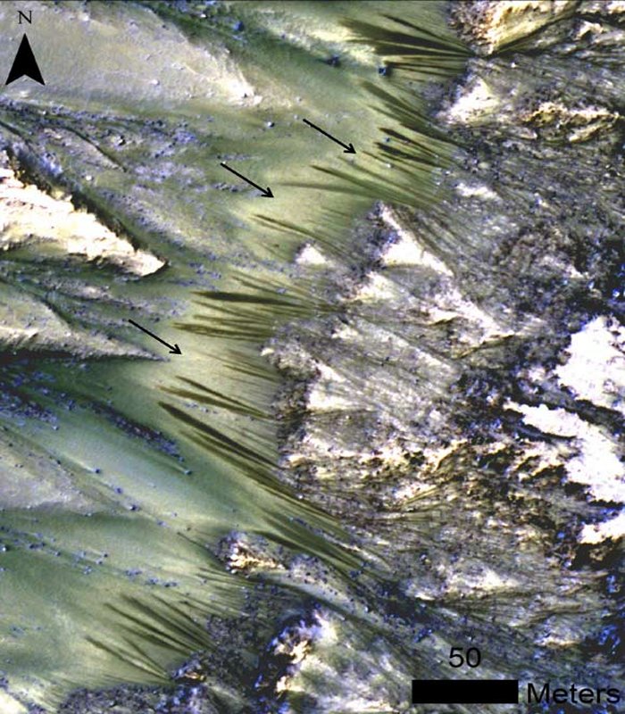 Recurring slope lineae emanating from bedrock exposures at Palikir crater on Mars during southern summer. Image credit: NASA/ Lujendra Ojha et al