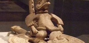 Ancient reptilian riding a vehicle