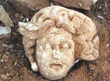 The head of Medusa, a Greek mythological creature who turned all that gazed upon her into stone.