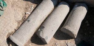 Three granite column fragments uncovered on the eastern side of the theatre.