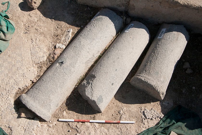 Three granite column fragments uncovered on the eastern side of the theatre.