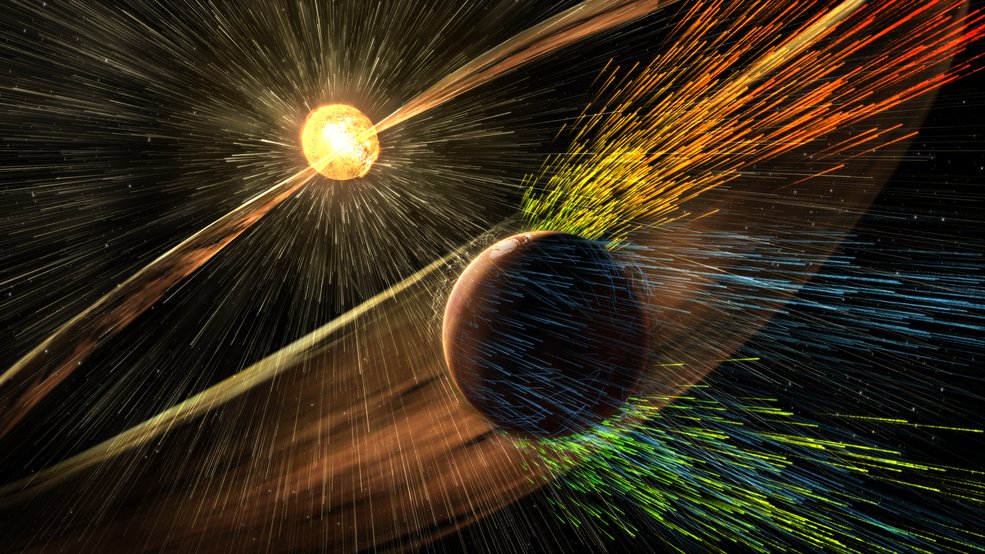 Artist’s rendering of a solar storm hitting Mars and stripping ions from the planet's upper atmosphere. Credits: NASA/GSFC