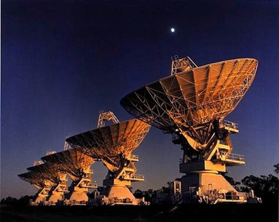 Radio dishes pointed skyward at the Australian Telescope Compact Array. Radio astronomy is the focus of the search for extraterrestrial intelligence, or SETI. (CSIRO)