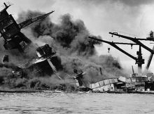 A U.S. battleship sinks during the Japanese attack on Pearl Harbor, Hawaii, in 1941. Credits: National Archives, Washington, D.C.