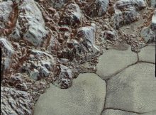 The Mountainous Shoreline of Sputnik Planum: Great blocks of Pluto’s water-ice crust appear jammed together in the informally named al-Idrisi mountains. Some mountain sides appear coated in dark material, while other sides are bright.Credit: NASA/Johns Hopkins University Applied Physics Laboratory/Southwest Research Institute