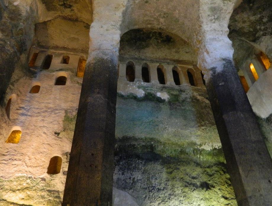 Hewn from solid limestone during the XII Century by Benedictine monks,from an upper plateau to the outside ground level. The monks utilised natural caverties and fault lines eroded by underground streams to help them in their tasks. Credits: Fiendishly French