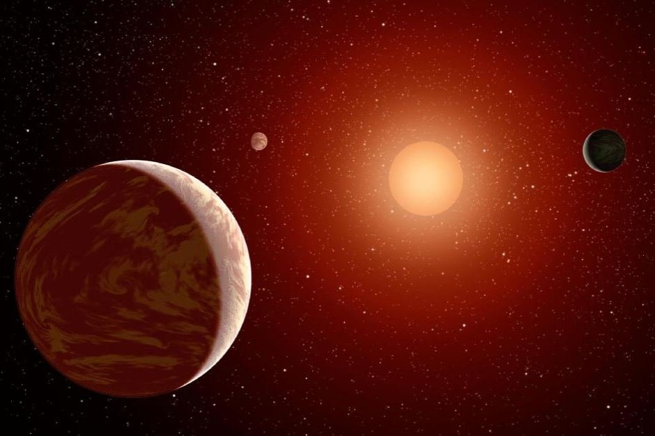 PHOTO: Artist's impression of exoplanets orbiting a spectral type M class red dwarf star (NASA/JPL-Caltech)