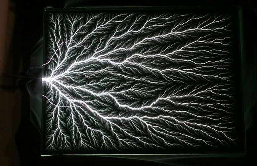 Captured Lightning: fractal-like Lichtenberg figures frozen in acrylic blocks by Bert Hickman