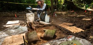 University of Washington Ph.D student Anna Cohen excavates stone bowls at the Valley of the Jaguars site in Honduras. PHOTOGRAPH BY DAVID YODER, NATIONAL GEOGRAPHIC