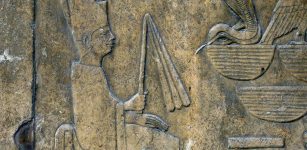 Detail of a relief showing pharaoh Sneferu wearing the white robe of the Sed-festival, from his funerary temple of Dahshur and now on display at the Egyptian Museum.