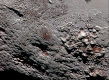 This composite image of a possible ice volcano on Pluto includes pictures taken by the New Horizons spacecraft’s Long Range Reconnaissance Imager (LORRI) on July 14, 2015, from a range of about 30,000 miles (48,000 kilometers), showing features as small as 1,500 feet (450 meters) across. Sprinkled across the LORRI mosaic is enhanced color data from the Ralph/Multispectral Visible Imaging Camera (MVIC), from a range of 21,000 miles (34,000 kilometers) and at a resolution of about 2,100 feet (650 meters) per pixel. The entire scene is 140 miles (230 kilometers) across. Image credit: NASA/JHUAPL/SwRI