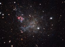 This image, captured with the OmegaCAM camera on ESO’s VLT Survey Telescope in Chile, shows an unusually clean small galaxy. IC 1613 contains very little cosmic dust, allowing astronomers to explore its contents with great clarity. Credit: ESO