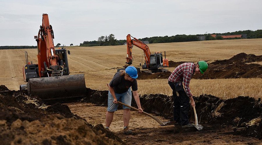 Historic coins believed to have been stashed away during a period of Nordic infighting have been discovered by a group of metal detector enthusiasts at a site earmarked for an Apple data center in Denmark.
