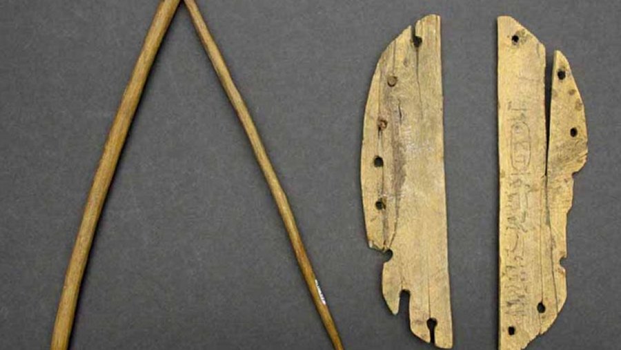 A miniature wooden hoe, and a set of miniature wooden rockers, marked with hieroglyphs, were found in a foundation deposit at Hatshepsut’s temple at Deir el-Bahri in the 1880s. Anthropology Museum/University of Winnipeg