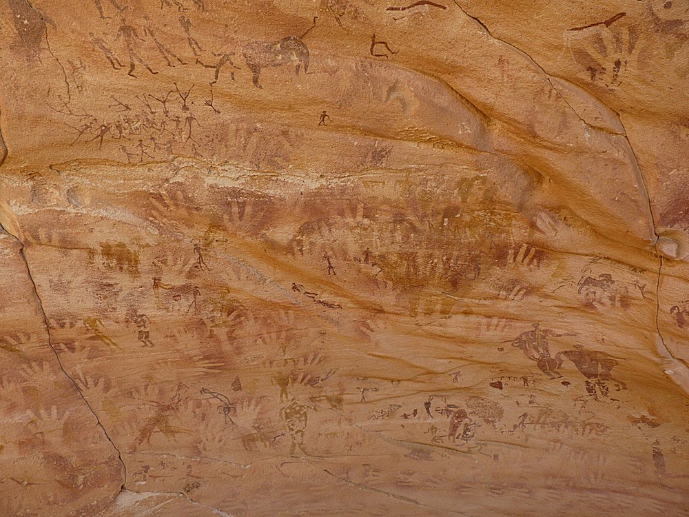 The rock walls at Wadi Sūra II are filled with intricate images. Credit: Emmanuelle Honoré