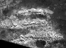 Cassini Spies Titan's Tallest Peaks Radar View of Titan's Tallest Mountains Mountains of Titan Map - 2016 Update The trio of ridges on Titan known as Mithrim Montes is home to the hazy Saturnian moon's tallest peak. Image credit: NASA/JPL-Caltech/ASI