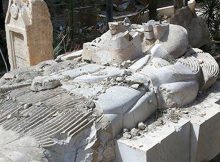 A view shows the damaged Lion of Al-Lat statue at the entrance of the museum of the historic city of Palmyra, after forces loyal to Syria's President Bashar al-Assad recaptured the city, in Homs Governorate in this handout picture provided by SANA on March 27, 2016 - REUTERS photo