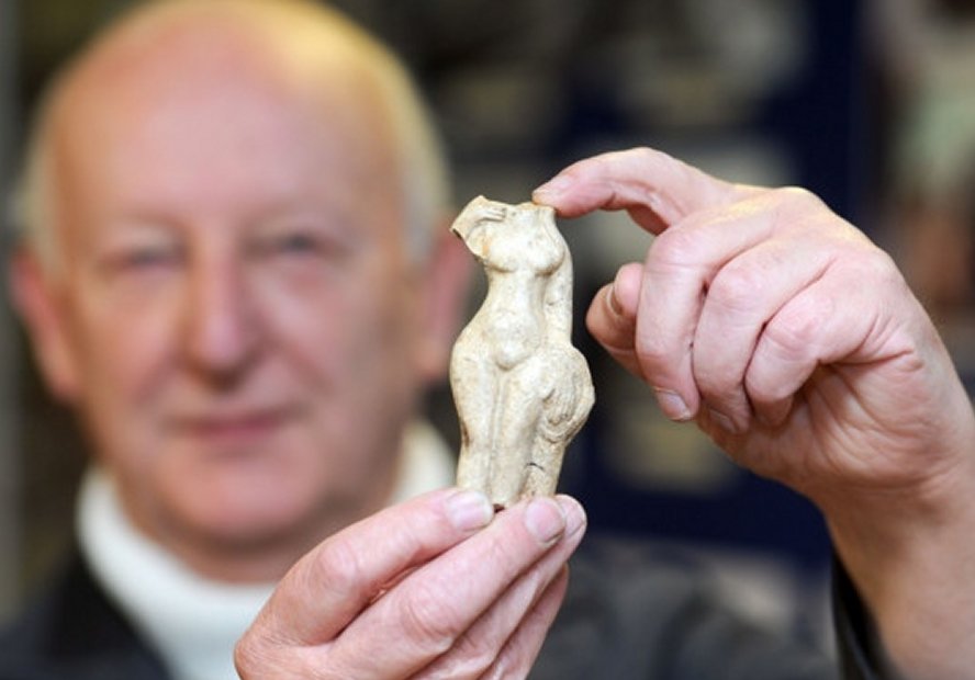 John Broughton is pictured with the Venus statue at the Long Melford Heritage Centre. Credits: East Anglian Daily Times