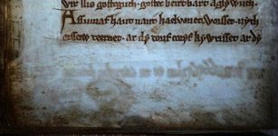 ghostly faces in ancient manuscript