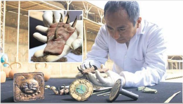 Ancient metal claws discovered in tomb of Mochica ruler.