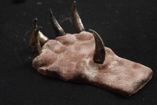 Ancient metal claws