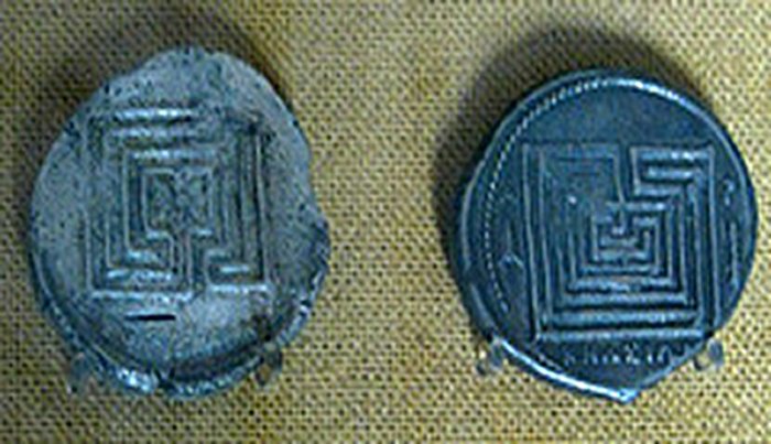 Coins from Knossos with depiction of labyrinth, c. 400 BCE. Photo by Tilemahos Efthimiadis.