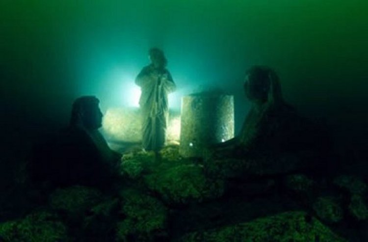 Mysterious ancient figures buried beneath the water.