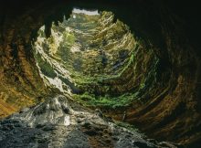 Devil’s Sinkhole – probably the largest known single-chamber cave in the state - is home to millions of bats living there during summer months and eating 30 tons of insects each night. Image credit: Laurence Parent via texascooppower.com