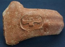 Stamped handle from Ramat Rahel in ancient Judea. The inscription reads “to be sent to the king / belonging to the king, Hebron” . CreditsOded Lipschits