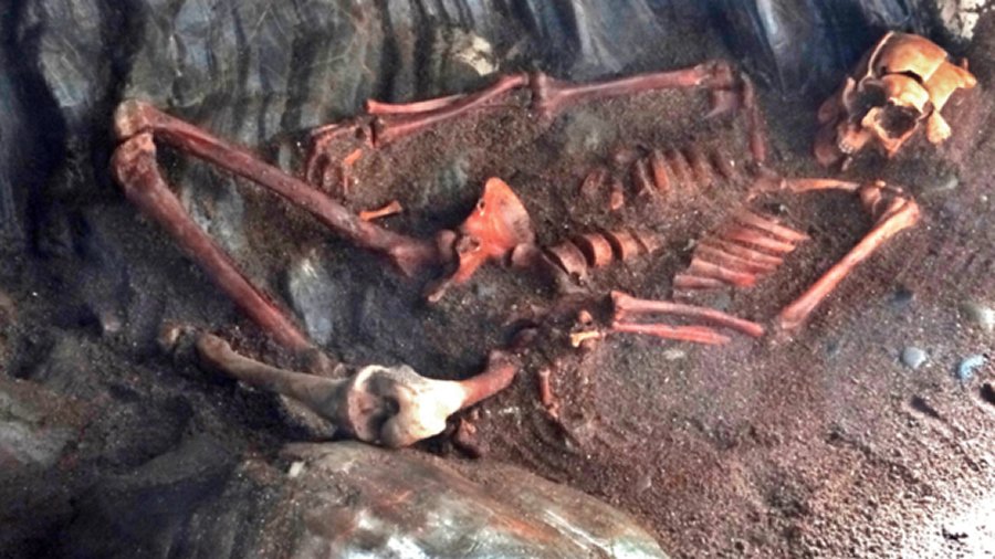 The body had been placed in an unusual cross-legged position, with large stones holding down his legs and arms. Image credits: Dundee University