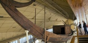 Tourists visit the ancient Pharaoh king Cheops' first solar boat, which was removed in pieces in 1954 and painstakingly reconstructed, during their visit to the boat museum at the Pyramids site in Giza, Egypt, Wednesday, March 29, 2017. (AP Photo/Amr Nabil)