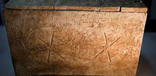 An ossuary with an inscription of Hebrew letters forming the word "Yeshua", is seen during a media tour presenting significant findings from the time of Jesus, Beit Shemesh, Israel.