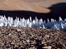 An example of the penitentes from the southern end of the Chajnantor plain in Chile. Though these ice formations only reach a few feet in height, while Pluto’s bladed terrain reaches hundreds of feet, they both have similar sharp ridges. Credits: Wikimedia Commons/ESO