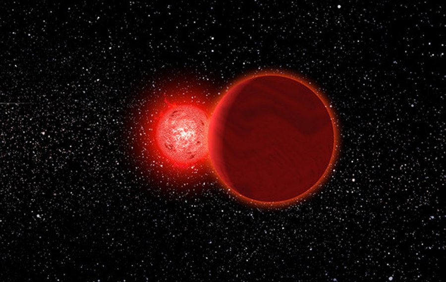 Artist's conception of Scholz's star and its brown dwarf companion (foreground) during its flyby of the solar system 70,000 years ago. The Sun (left, background) would have appeared as a brilliant star. The pair is now about 20 light years away. / Michael Osadciw/University of Rochester