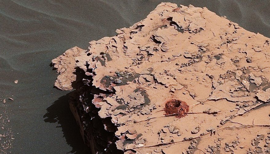 NASA's Curiosity rover successfully drilled a hole 2 inches (5.1 centimeters) deep in a target called "Duluth" on May 20, 2018. The hole is about .6 inches (1.6 centimeters) across. It was the first rock sample captured by the drill since October 2016. A mechanical issue took the drill offline in December 2016. Image credit: NASA/JPL-Caltech/MSSS