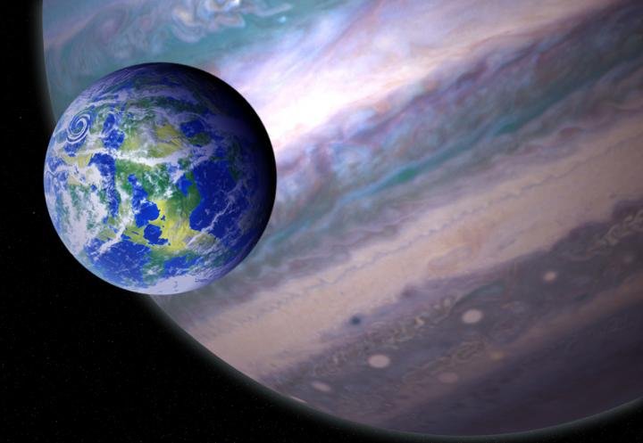 This is an artist's illustration of a potentially habitable exomoon orbiting a giant planet in a distant solar system. Credit: NASA/GSFC: Jay Friedlander and Britt Griswold