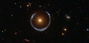 The gravitational lens from LRG 3-757 galaxy taken with the Hubble Space Telescope’s Wide Field Camera 3. Credit: ESA/Hubble & NASA