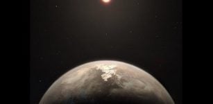 This artist's impression shows the temperate planet Ross 128 b, with its red dwarf parent star in the background. Credit: courtesy of ESO/M. Kornmesser