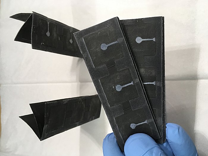 Researchers harnessed bacteria to power these paper batteries. Credit: Seokheun Choi