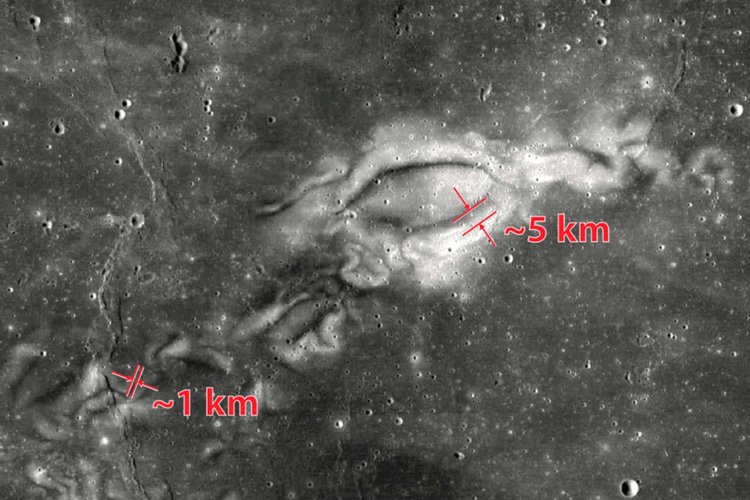 A Wide Field Camera view of Reiner Gamma, also taken from the Lunar Reconnaissance Orbiter, shows alternating bands of bright lobes and dark lanes that vary from 1 to 5 kilometers in scale. (NASA image)