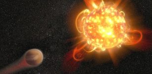 Violent outbursts of seething gas from young red dwarf stars may make conditions uninhabitable on fledgling planets. In this artist's rendering, an active, young red dwarf (right) is stripping the atmosphere from an orbiting planet (left). Scientists found that flares from the youngest red dwarfs they surveyed — approximately 40 million years old — are 100 to 1,000 times more energetic than when the stars are older. They also detected one of the most intense stellar flares ever observed in ultraviolet light — more energetic than the most powerful flare ever recorded from our Sun. Credits: NASA, ESA and D. Player (STScI)