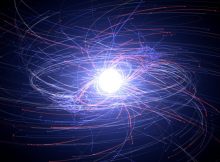 Electrons (blue) and positrons (red) from a computer-simulated pulsar. These particles become accerlated to extreme energies in a pulsar's powerful magnetic and electric fields; lighter tracks show particles with higher energies. Each particle seen here actually represents trillions of electrons or positrons. Better knowledge of the particle environment around neutron stars will help astronomers understand how they behave like cosmic lighthouses, producing precisely timed radio and gamma-ray pulses. Credit: NASA's Goddard Space Flight Center