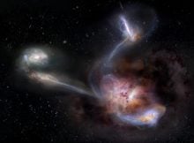 Artist impression of W2246-0526, the most luminous known galaxy, and three companion galaxies. Credit: NRAO/AUI/NSF, S. Dagnello.