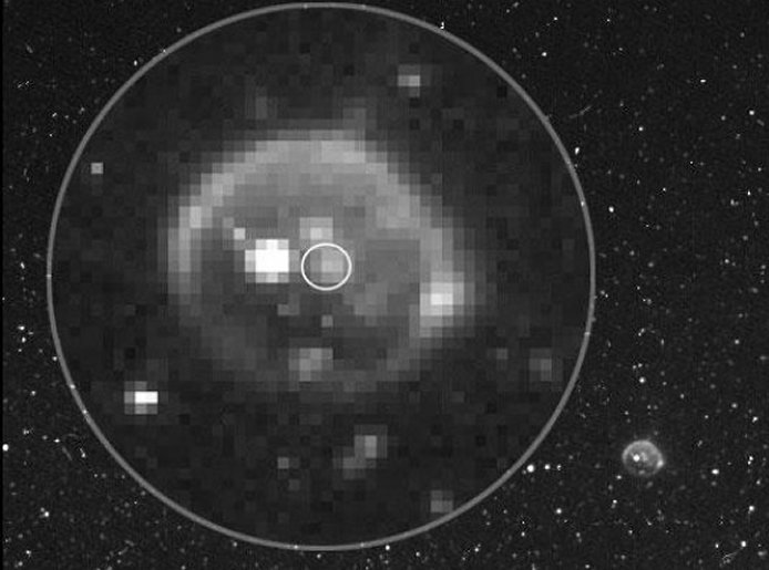Juno's Radiation Monitoring Investigation collected this image of Jupiter's moon Io with Juno's Stellar Reference Unit (SRU) star camera shortly after Io was eclipsed by Jupiter at 12:40:29 (UTC) Dec. 21, 2018. Io is softly illuminated by moonlight from another of Jupiter's moons, Europa. The brightest feature on Io is suspected to be a penetrating radiation signature. The glow of activity from several of Io's volcanoes is seen, including a plume circled in the image. Credit: NASA/JPL-Caltech/SwRI