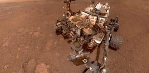 In a selfie taken in mid-January 2019, Mars rover Curiosity prepares to enter a new, clay-mineral-rich unit on its traverse up Mount Sharp in Gale Crater. Mission scientists are anxious to see what a new gravity-measuring technique will reveal about the mountain and Gale Crater's history. Credit: NASA/JPL-Caltech/MSSS