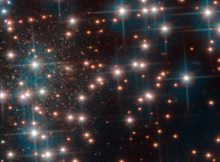 This image, taken with Hubble’s Advanced Camera for Surveys shows a part the globular cluster NGC 6752. Behind the bright stars of the cluster a denser collection of faint stars is visible — a previously unknown dwarf spheroidal galaxy. This galaxy, nicknamed Bedin 1, is about 30 million light-years from Earth. Credit: ESA/Hubble, NASA, Bedin et al.